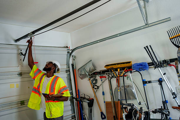 Professional Garage Door Panel Replacement technician working in Stanislaus County County, CA